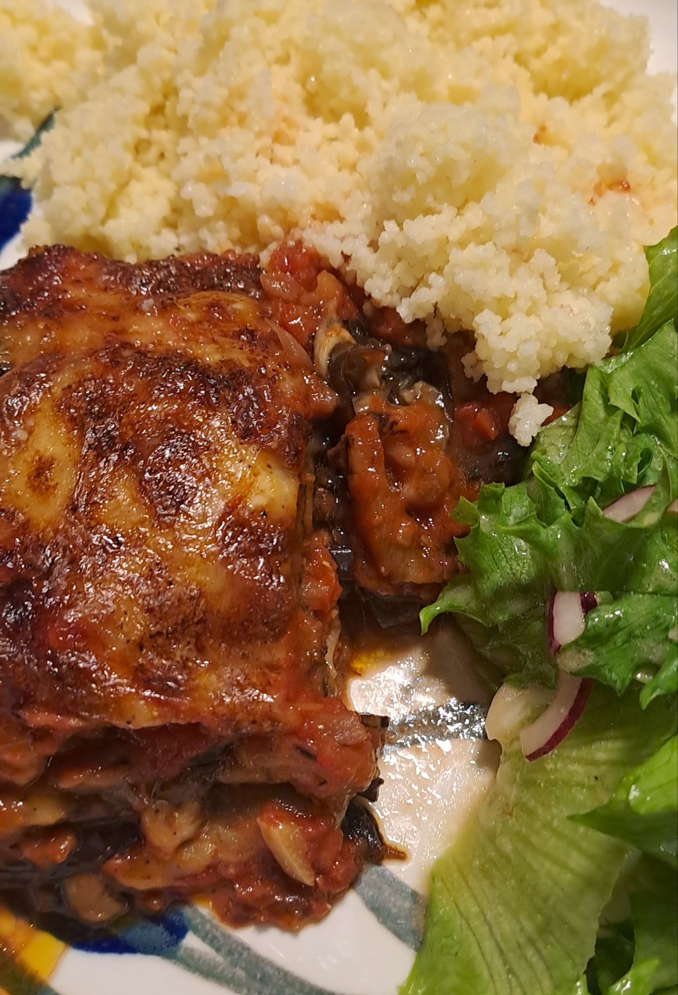 Classic parmigiana with couscous and salad